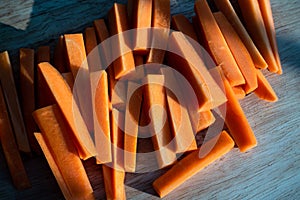 Fresh organic carrots sliced on the table