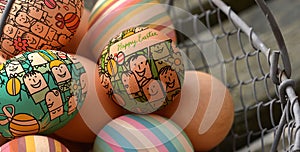 Fresh organic chicken eggs with Easter decoration, in a metal basket