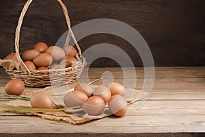 Fresh organic chicken eggs from the farm on a rustic wooden table