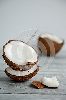 Fresh organic coconut on rustic wooden background