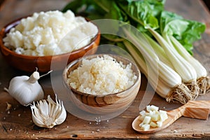 Fresh Organic Cottage Cheese in Wooden Bowl with Garlic and Greens on Rustic Table