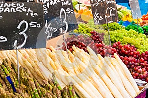 Fresh organic fruit and vegetables at farmers market stall