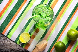 Fresh organic fruits cocktail on colorful background, fresh, tasty and healthy fruits cocktail. Green cocktail juice with apple, k