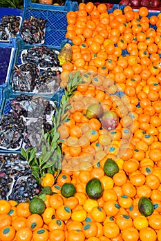 Fresh and organic fruits at farmers market. Colorful and varied mix of legumes, veggie and fruits