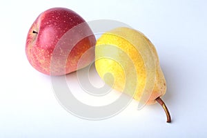 Fresh organic fruits isolated on white background. Assorted apple and pear.