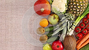 Fresh organic fruits and vegetables appear on right side. Stop motion