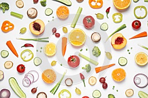 Fresh organic fruits and vegetables on white background, flat lay