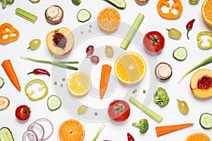 Fresh organic fruits and vegetables on white background, flat lay