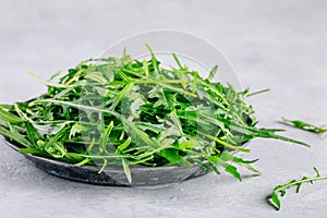 Fresh organic green leaves of arugula, ingredient for healthy salad