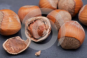 Fresh organic high quality hazelnuts, filberts on natural stone