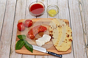 Fresh organic ingredients for making homemade pizza dinners