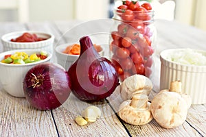 Fresh organic ingredients measured and chopped ready for making healthy family soups and strews for winter meals