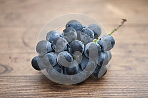 Fresh organic Japanese grapes on table