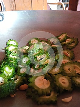 Fresh organic karela salad on a plate