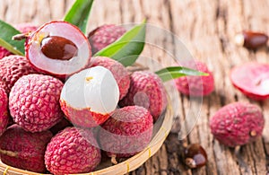 Fresh organic lychee fruit on bamboo basket