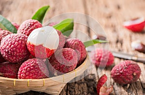 Fresh organic lychee fruit on basket