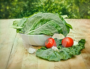 Fresh organic mangold - spinach beet on table