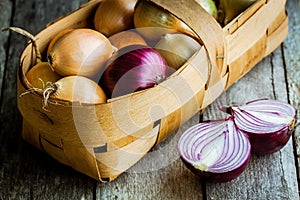 Fresh organic onions in a basket