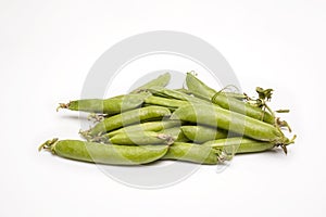 Fresh organic peas isolated on white background
