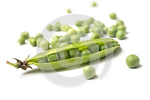 fresh organic peas on white background