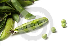 fresh organic peas on white background