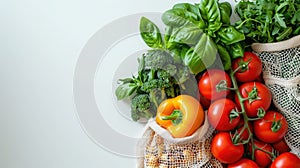 Fresh organic produce in a recyclable paper bag on a white background, concept of sustainable grocery shopping