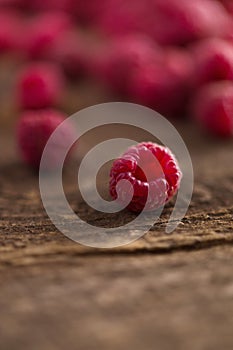 Fresh Organic Raspberries on wood surface