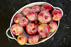 Fresh organic red apples in a basket