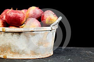 Fresh organic red apples in a basket