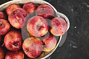 Fresh organic red apples in a basket