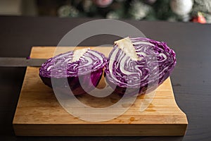 Fresh Organic Red Cabbage CloseUp on Wooden Board - Vibrant and Nutrient-Rich Beauty