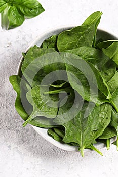 fresh organic spinach in a bowl