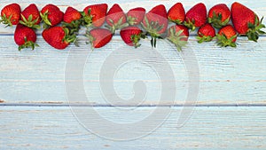 Fresh and organic strawberries moving on the top - Stop motion