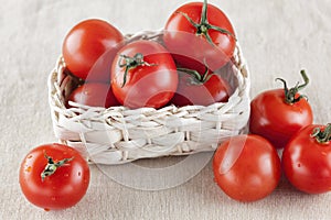 Fresh organic tomatoes in a basket