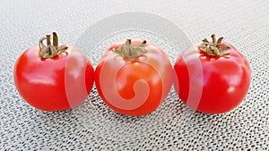 Fresh organic tomatoes on kitchen table.