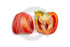 Fresh organic vegetable Bulgarian pepper, two cut halves , isolated