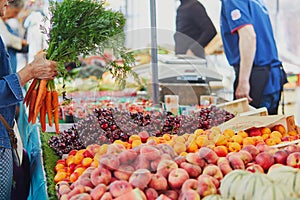 Fresh organic vegetables and fruits on farmer market in Paris, France