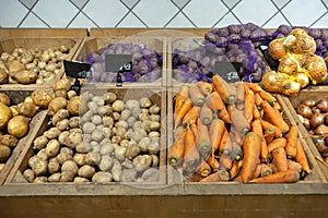 Fresh organic Vegetables on shelf in supermarket, farmers market.