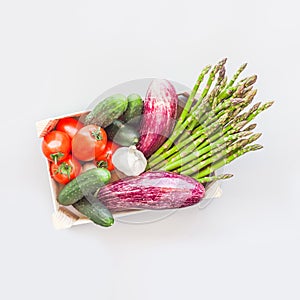 Fresh organic vegetables in wooden box