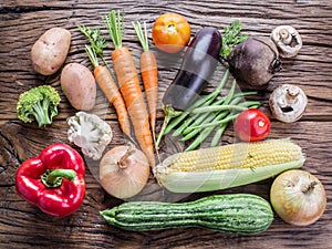 Fresh organic vegetables on the wooden table.