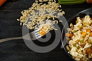 Fresh Orzo Salad With carrots, leeks, red and green pepper.