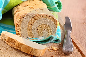 Fresh from the oven gluten free bread on a cutting board