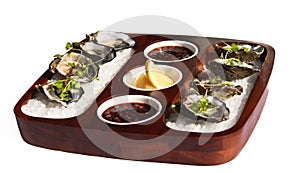Fresh oyster appetiser on white photo