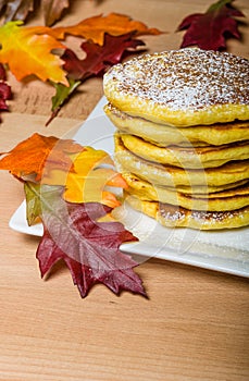 Fresh pancakes with fall leaves
