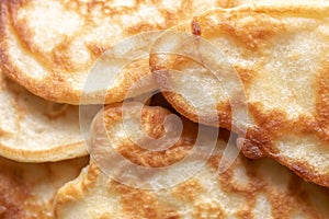 fresh pancakes on a glass dish. authentic homemade food. background backdrop