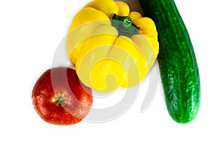 Fresh paprika, cucumber, tomato isolated on white background. Organic vegetables. Healthy eating concept.