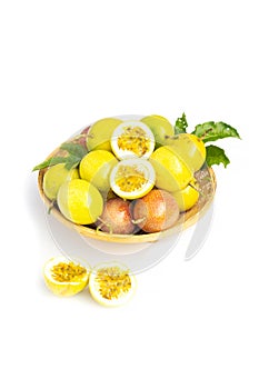 Fresh passion fruit in basker on white background