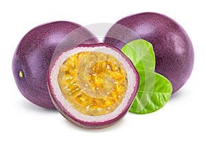 fresh passion fruit with green leaves isolated on white background. exotic fruit. clipping path