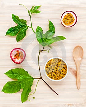 Fresh passion fruits set up on wooden background. Juicy passion