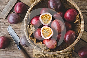 Fresh passion fruits on wood background